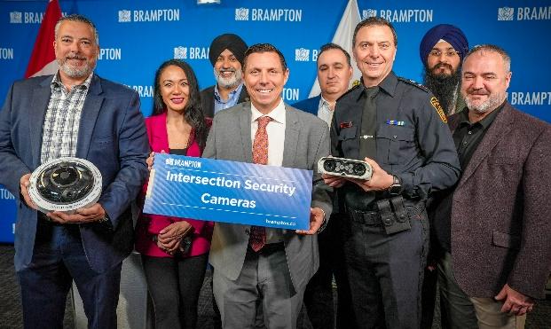 Brampton officials and police showcase new intersection security cameras at a press event.